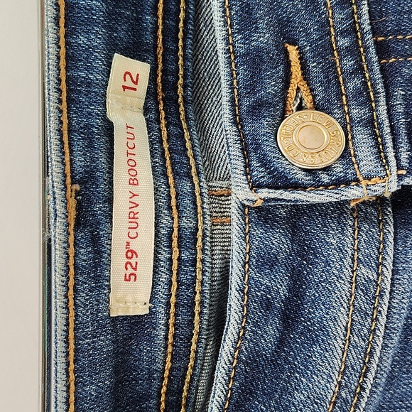 Levi's 529 Curvy Bootcut Denim Jeans Size 12 Material Fade Mid Rise - Picture 4 of 10